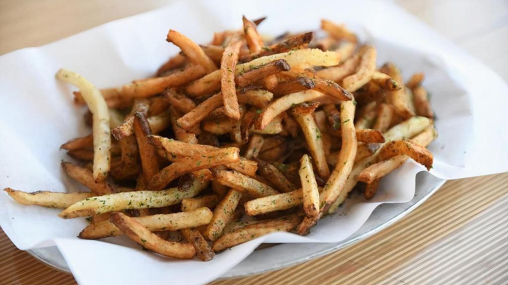 Truffle Fries · K fries tossed with truffle salt and parsley. (328)