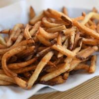 K Fries · Golden brown skin-on Kennebec potatoes, hand-cut, fried, sprinkled with pure ocean sea salt....