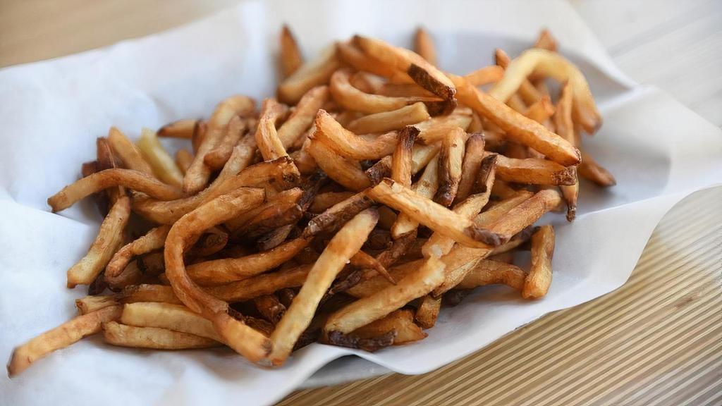K Fries · Golden brown skin-on Kennebec potatoes, hand-cut, fried, sprinkled with pure ocean sea salt. Organic ketchup available. (324)