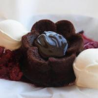 Kiss My Bundt · Chocolate bundt cake made from scratch in our kitchen, filled with hot fudge, topped with va...