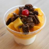 Mango Pecan · Vanilla frozen custard topped with fresh mangos, roasted pecans and two cherries.
