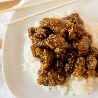 Sesame Beef · Spicy. Crunchy batter-fried beef caramelized in sweet sauce seasoned with garlic & spices. S...