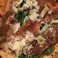 Prosciutto E Rucola Pizza · Provola, prosciutto crudo, arugula, parmigiano reggiano and extra virgin olive oil.