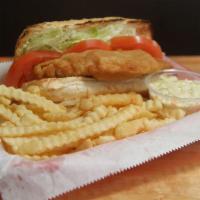 Tilapia Sandwich · Lightly breaded Tilapia fillet  on a toasted French bread with lettuce tomato and tartar sau...