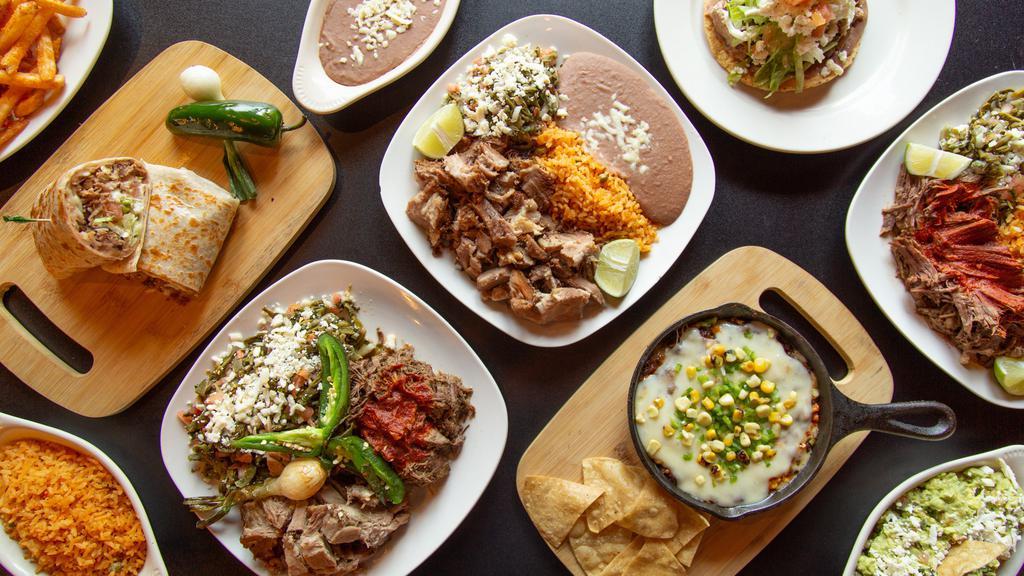 Taco Dinner · Includes Includes 3 tacos with your choice of meat (steak, chicken, carnitas and barbacoa) with rice and beans.