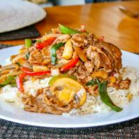 Teriyaki Over Baked Rice · White meat chicken or thinly sliced beef teriyaki stir fried with bell peppers, mushroom, & ...