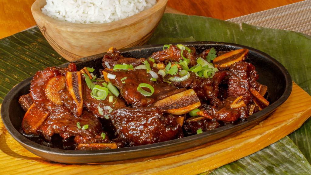 Korean Barbecue Short Ribs · Served with steamed rice. Brown or fried rice with an extra charge