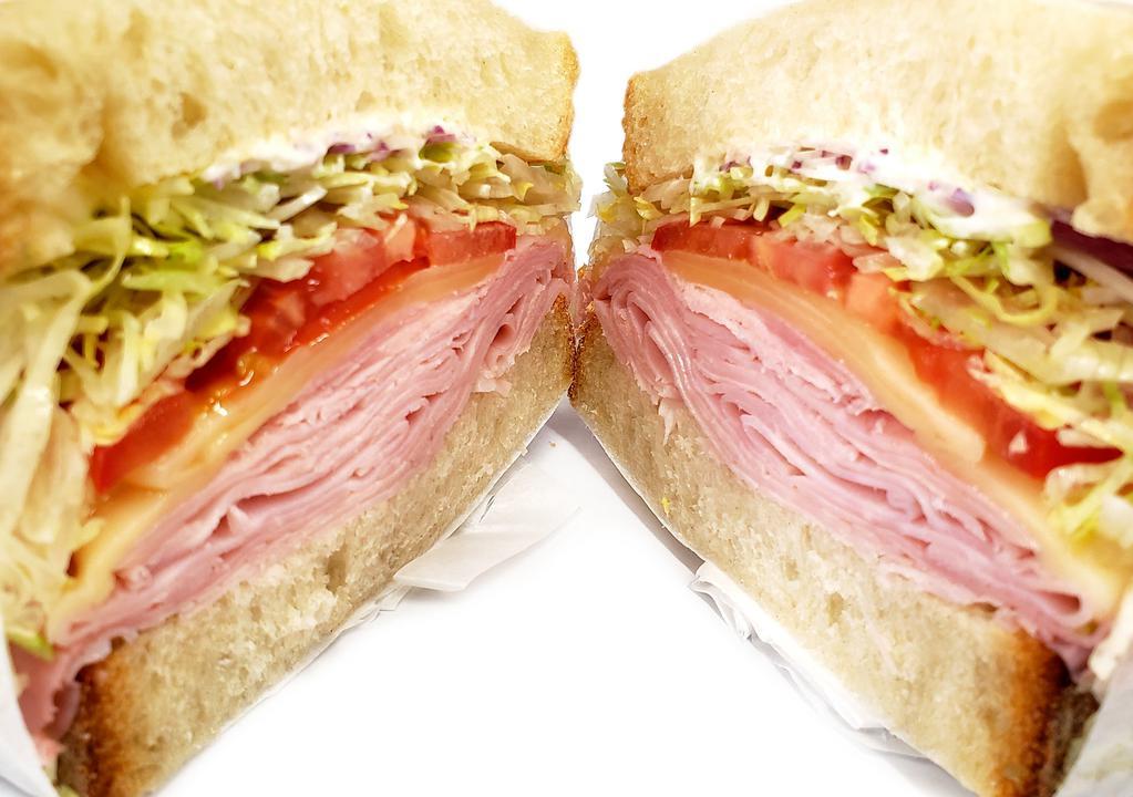 Ham & Swiss · Ham, swiss cheese, lettuce, tomato, onion, and mayo on Italian bread.