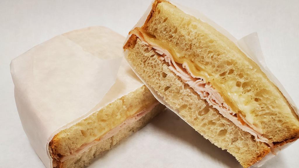 Kids Turkey & Swiss · Turkey, swiss, and mayo on Italian bread.  Comes with a free combo!  No customization is used on this sandwich except for mayo, and how you would like the sandwich to be toasted.