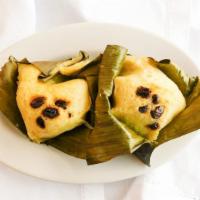 Quimbolitos (Each) · Sweet steamed cake with raisins.