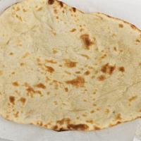Naan · Soft leavened bread shaped in to a leaf, cooked in clay oven.