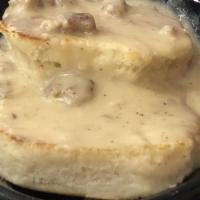 Biscuits & Sausage Gravy · With hash browns.
