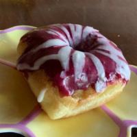 Blueberry Lemon Doughnut · FRESH blueberry glaze with a tart lemon drizzle!