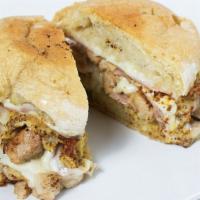 Cuban Sandwich · Handmade ciabatta rolls with in-house smoked pork shoulder, pickles, country ham, and melted...