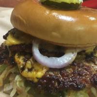 The Smash Burger · Two dark meat chicken patties, bistro sauce, lettuce, pickle, red onion, American cheese, br...