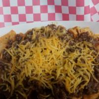 Frito Pie · Frito corn chips topped with chili and cheese.