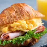 Ham, Egg & Cheese On Croissant · Homemade ham, egg & cheese on a warm croissant.