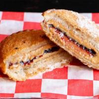 Deep Fried Pb&J Uncrustable - Double · Topped with Powdered Sugar and served with Chocolate Dipping Sauce