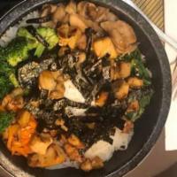 Nabeyaki Udon · Japanese hot pot with veggies, crab, chicken, onion, egg, seaweed, and shrimp tempura.