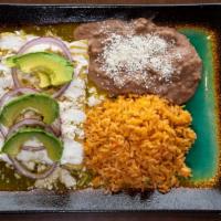 Enchiladas Verdes · Three enchiladas choice of barbacoa, cochinita pibil, chipotle chicken or veggies, topped wi...