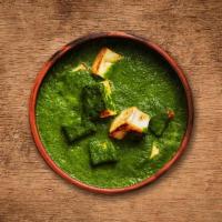 Spinach Cottage Cheese Curry · A combination of spinach and cottage cheese cooked in ginger, garlic and cream-spinach gravy