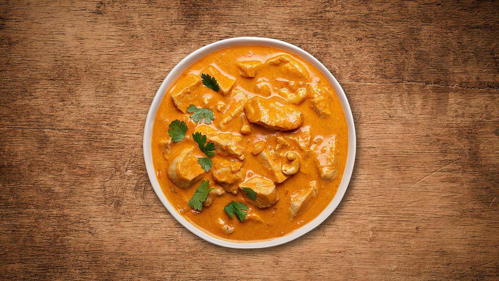 Butter Chicken Delight  · Tender chunks of char grilled tandoori chicken in a In A Light Creamy Tomato Sauce And House Special Butter