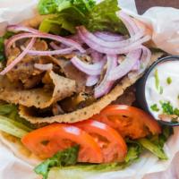 Gyro Sandwich · Thin slices of gyros served hot on a full pita loaf, lettuce, tomatoes, onions, and tzatziki...