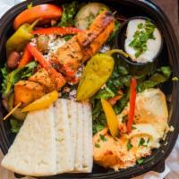 Chicken Kabob · With Greek salad, pita, garlic dip, and rice.