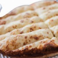 Cheese Bread · Baked bread that has been flavored with cheese.