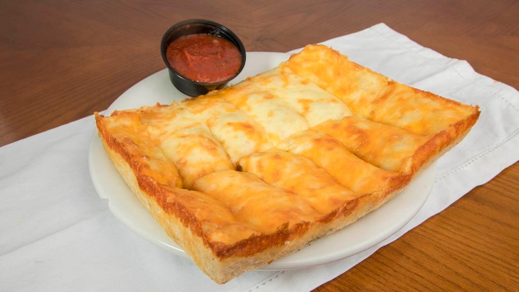 Cheesy Bread · Vegetarian. Homemade dough, garlic Parmesan butter, ranch, or pizza sauce on the side.