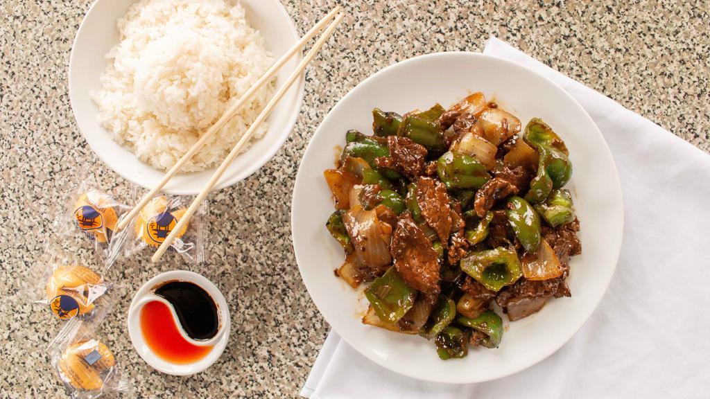 Wong'S Pepper Steak · Sliced tenderloin of beef stir fried with green peppers, onions, and Oriental spices in a delectable sauce. Served with white rice.