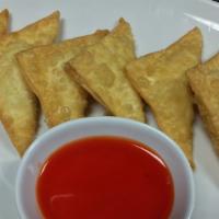 7 Piece Crab Rangoon · Fried wonton wrapper filled with crab and cream cheese.