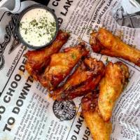 Wings: Bone-In Or Bone-Out · 1 pound of jumbo wings or fresh cut strips lightly dusted in seasoned flour and fried. Tosse...