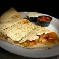 Cantina Quesadilla · Large flour tortilla, grilled, filled with mixed cheeses grilled chicken, scallions, tomatoe...