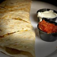 Caramba Quesadilla · Large flour tortilla, grilled, filled with grilled chicken, jalapeños, pineapple, onions, pe...
