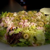 Maurice · Julienned ham, turkey, swiss cheese, chopped sweet gherkins, and mixed greens. Tossed in our...
