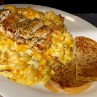 Ultimate Mac And Cheddar · Our cheddar cheese sauce, cavatappi pasta, bacon, scallions, topped with a grilled chicken b...