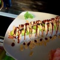 Flying Dragon · Crab mix, shrimp tempura, avocado, and cucumber slices topped with avocado and eel slices, s...