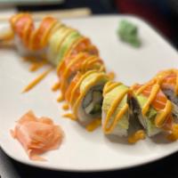 New Yorker · Shrimp tempura, cream cheese, and cucumbers, topped with salmon, avocado, with spicy mayo dr...