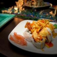 Buffalo Chicken · Tempura chicken tossed in buffalo sauce, carrots and celery topped with blue cheese crumbles...