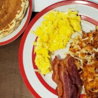 Super Combo · Two fried eggs, two pancakes, hash browns, three bacon or three sausage links.