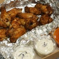 Buffalo Chicken Wings (10) · What ?? A buffalo with chicken wings! Good eating. Meaty buffalo chicken wings served with a...