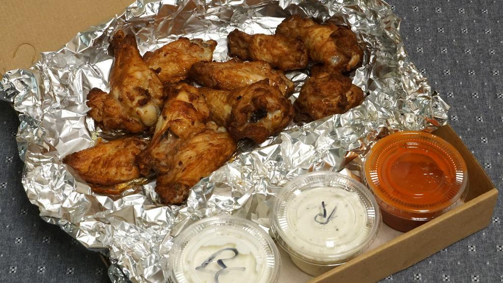 Buffalo Chicken Wings (10) · What ?? A buffalo with chicken wings! Good eating. Meaty buffalo chicken wings served with a side of blue cheese or ranch dressing.