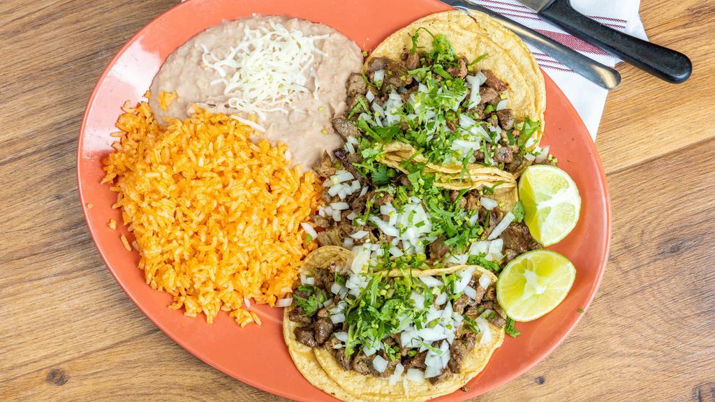 Taco Dinner · Favorite. Three tacos your choice of corn or flour tortillas serve with rice and beans.