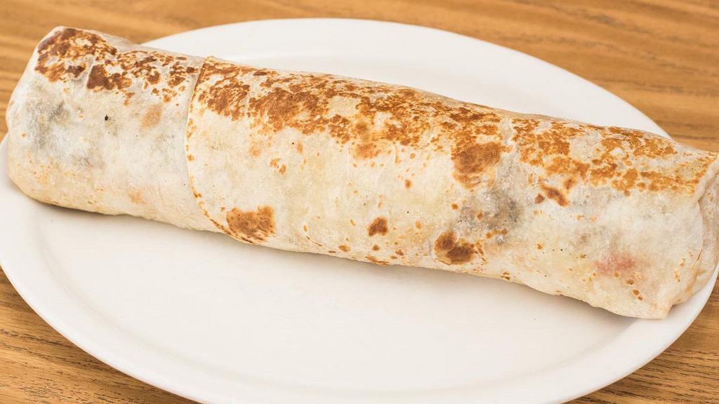 Giant Beef  Burrito  · Filled with cheese, lettuce, tomato, sour cream, rice, onions, cilantro, and ground beef.
 ***Menu Disclaimer:Special instructions are for preparation purposes and food allergies ONLY. Extra items will not be honored.***