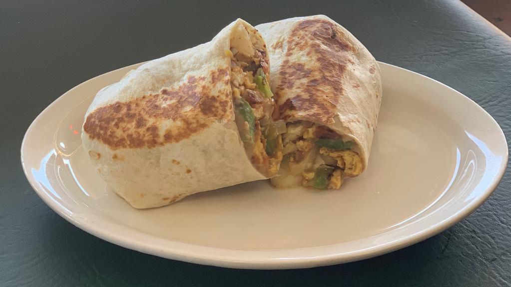 Burrito · With beans, cheese, lettuce, and tomato.**Special instructions (notes) are for preparations purpose and food allergies ONLY. Extra items will be honored.