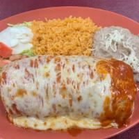 Fajiburrito Chicken Suizo · Filled with grilled chicken, bell peppers, onions, beans, and cheese. Rice, beans, lettuce, ...