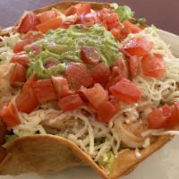 Taco Salad · Comes with ground beef or shredded chicken, tomatoes, beans, cheese, guacamole and sour crea...