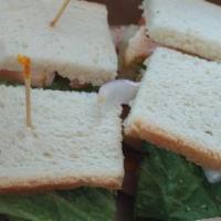 Classic Club · Double Decker Club Sandwich with bacon, turkey, ham, cheddar cheese, lettuce, tomato, onion,...