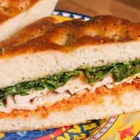 Roasted Chicken And Red Pepper Relish Sandwich · Slow Roasted Free Range Chicken Breast, Red Pepper-Almond Pesto,  Provolone and Crisp Greens